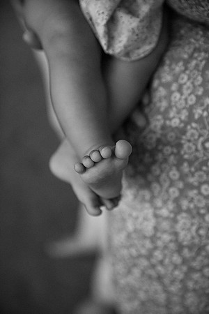 black and white baby feet close up details, precious moments in life, family portraits, family love