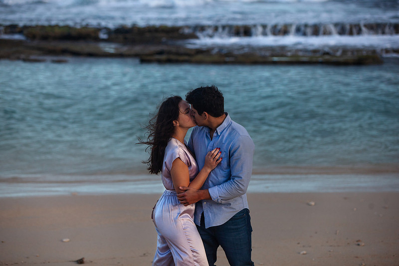 Giulia & Andrew | Maui Sunrise Portrait Session. Couples portrait session on Maui's north shore at sunrise. Mixture of greenery and blue water backdrops and a variety of candid and posed photographs. Scenic panoramic images to showcase Maui's landscape and natural beauty.