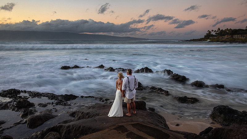 West Maui beach elopement at Napili Bay. Officiated by Kahu Kale Kaalekahi. Florals by Aloha Flower Co. Photography by Madelynne Lorraine.