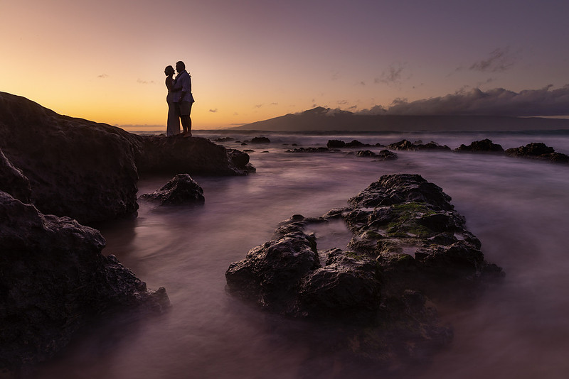 West Maui beach elopement at Napili Bay. Officiated by Kahu Kale Kaalekahi. Florals by Aloha Flower Co. Photography by Madelynne Lorraine.